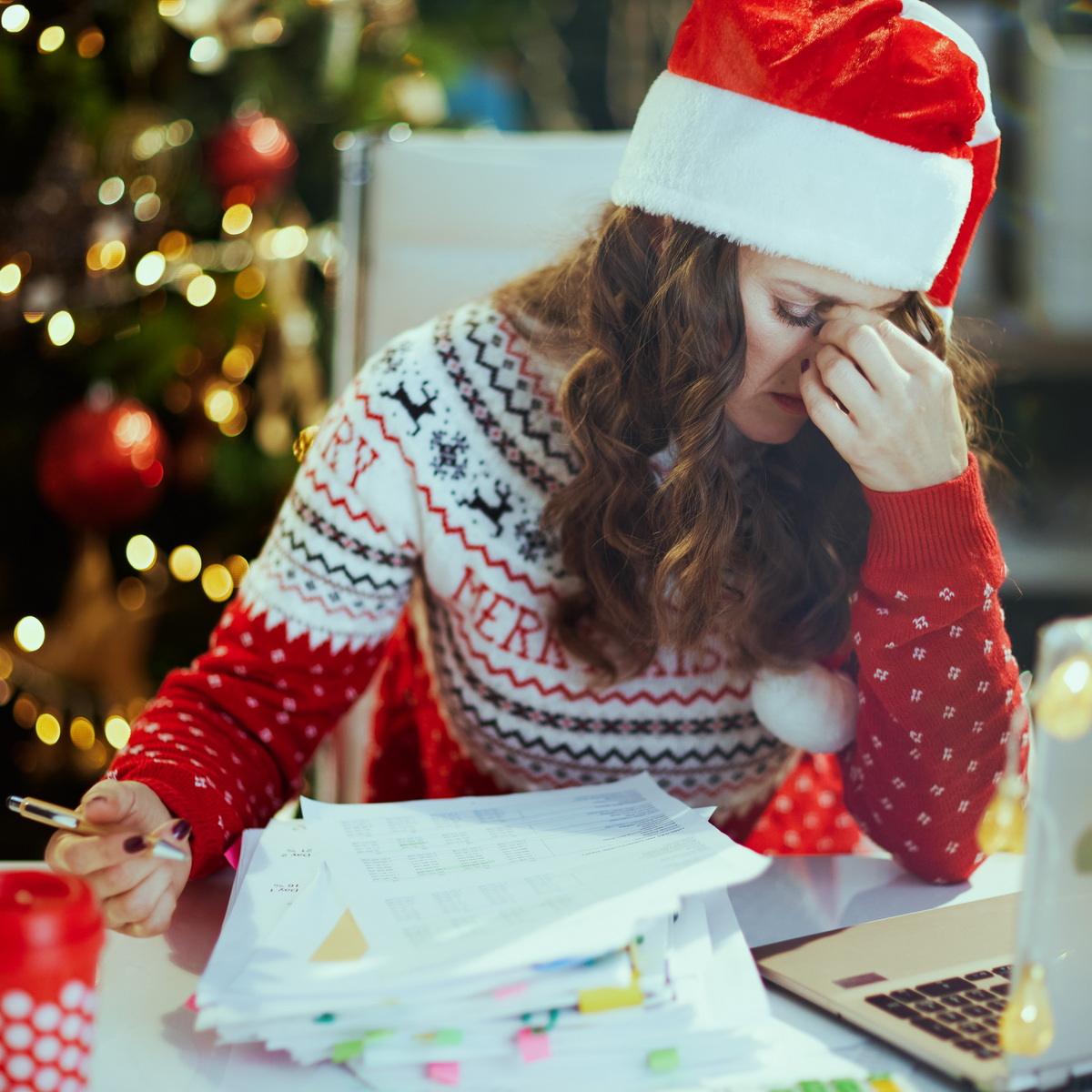 A business owner stressed over business slowing down over the holiday season partly due to not having a marketing strategy or working on her business's Local SEO