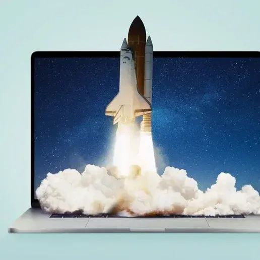 Rocket launching out of a laptop screen — what to do after your website launches