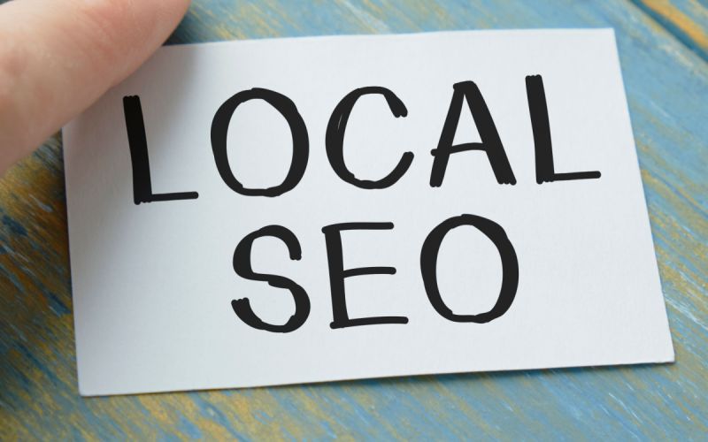 Business owner makes a note to remind him about the importance of Local SEO to his Houston digital marketing efforts.