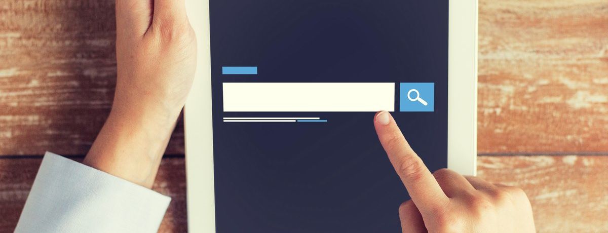 Business owner running a search for a Houston marketing company's SEO tips