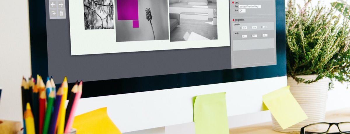 Graphic designer's desk as they plan new visuals for Houston digital marketing strategy