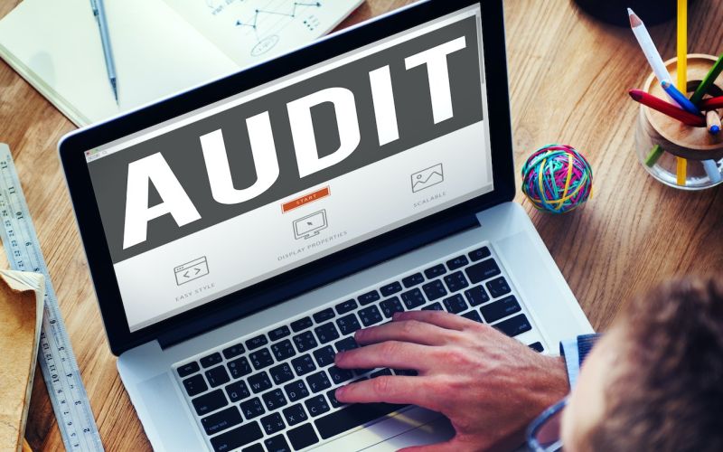 Marketer assessing Houston web design by completing a free website audit