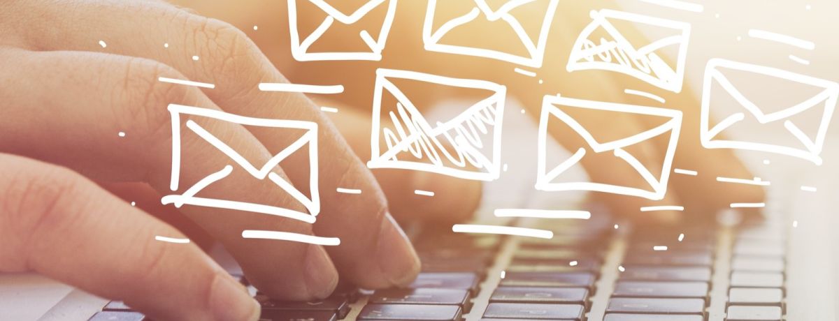 image of business owner sending marketing emails