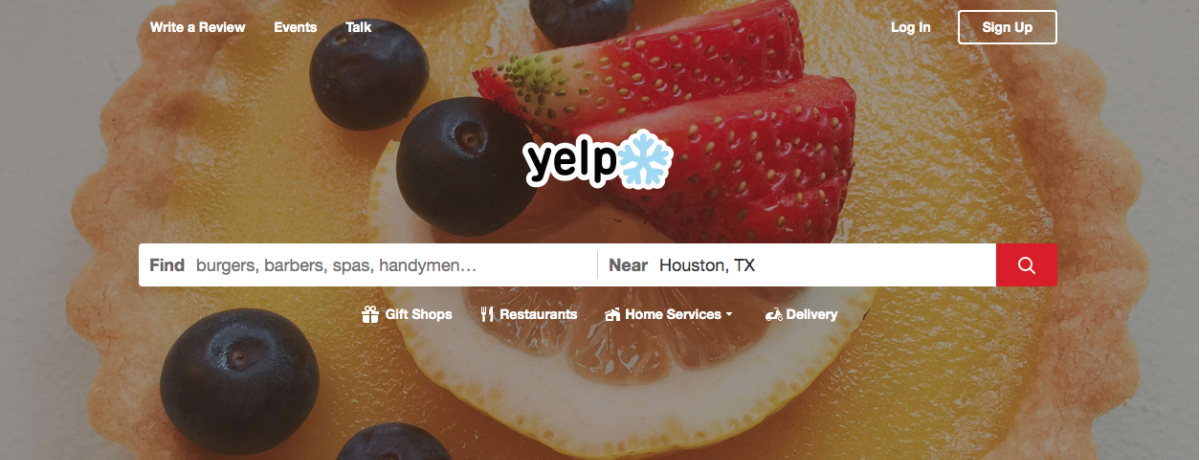 Yelp desktop homepage showing search bar for local businesses