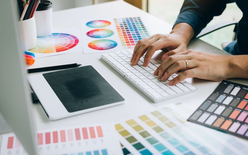 Graphic designer from Houston marketing agency planning a new logo design