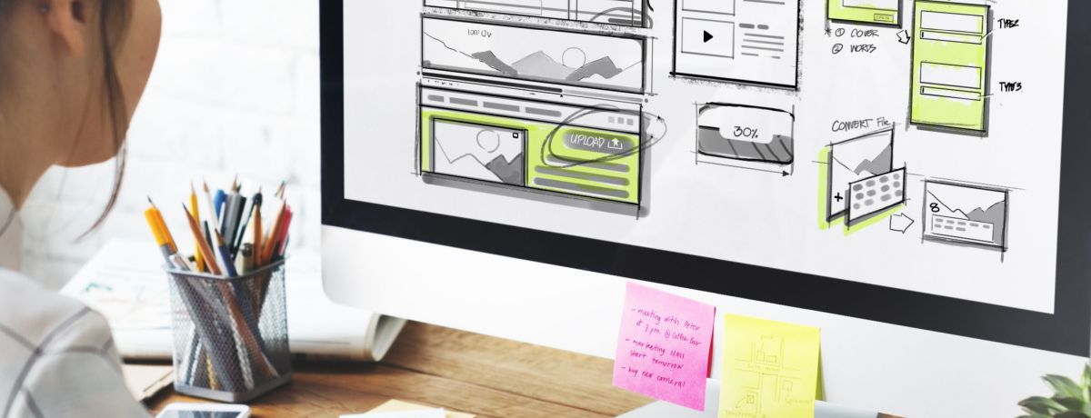 A Houston marketing agency designer performing Houston web design to implement a client's Houston digital marketing strategy.