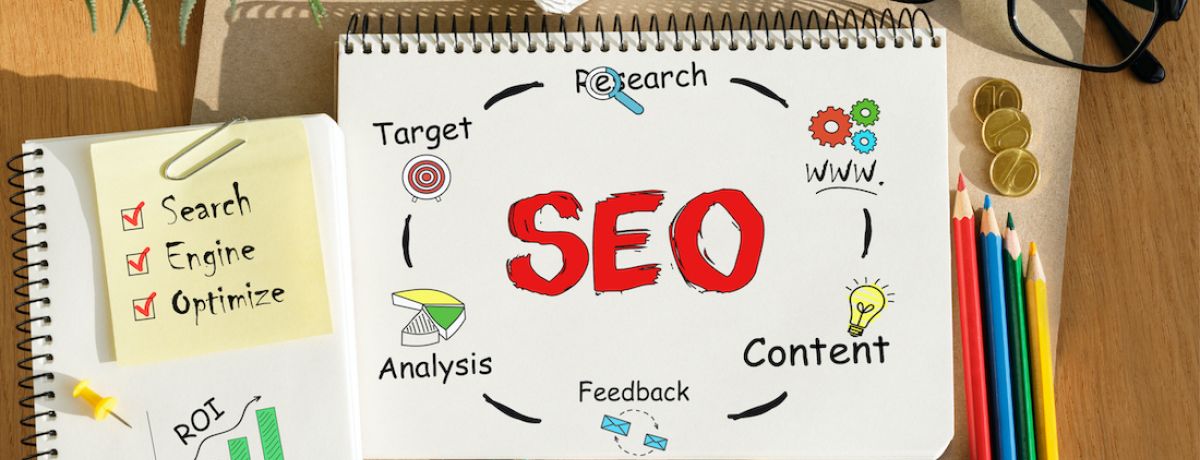 SEO diagram on a notebook with research, content, and target audience