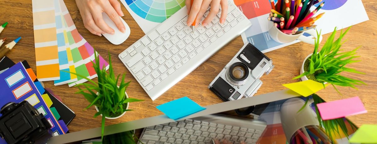 Houston marketing agency in-house graphic designer designing a new logo