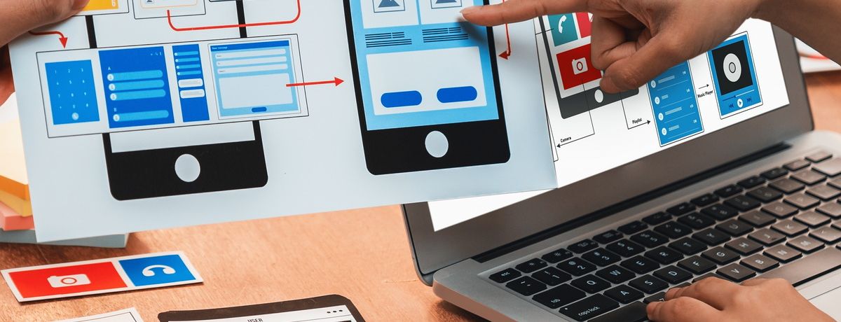 A Houston web designer working on the mobile-ready version of the site for an improved user experience.
