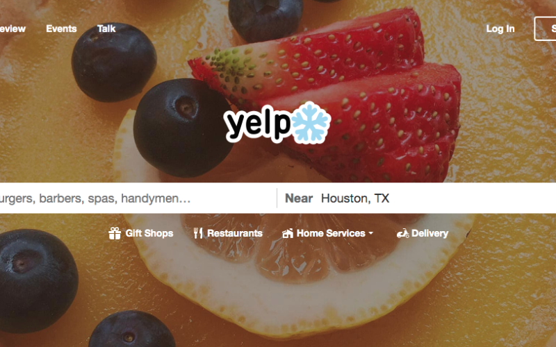 Yelp desktop homepage showing search bar for local businesses