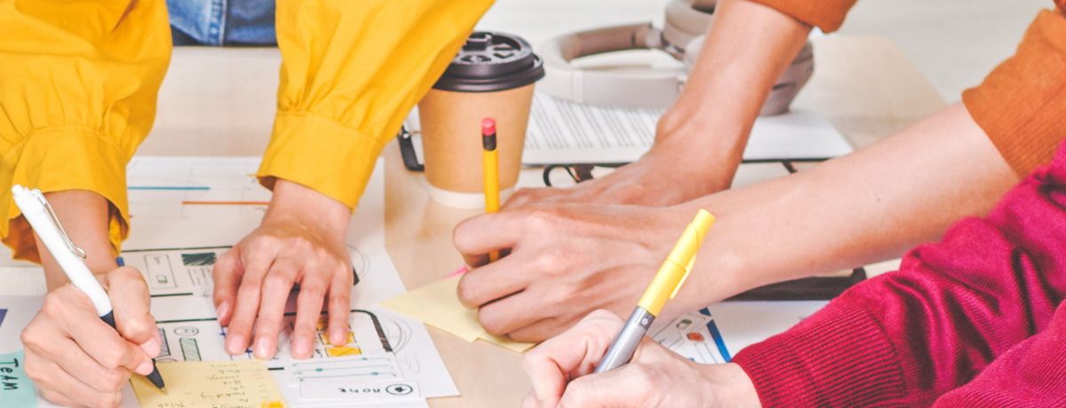 Members of a cross-functional team from a Houston marketing agency formulating a Houston marketing strategy for a client.