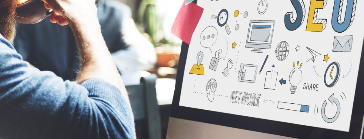 Developer integrates SEO to his custom Houston web design while drinking coffee.