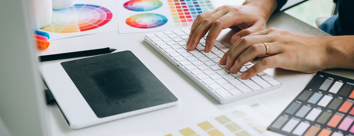 Graphic designer from Houston marketing agency planning a new logo design