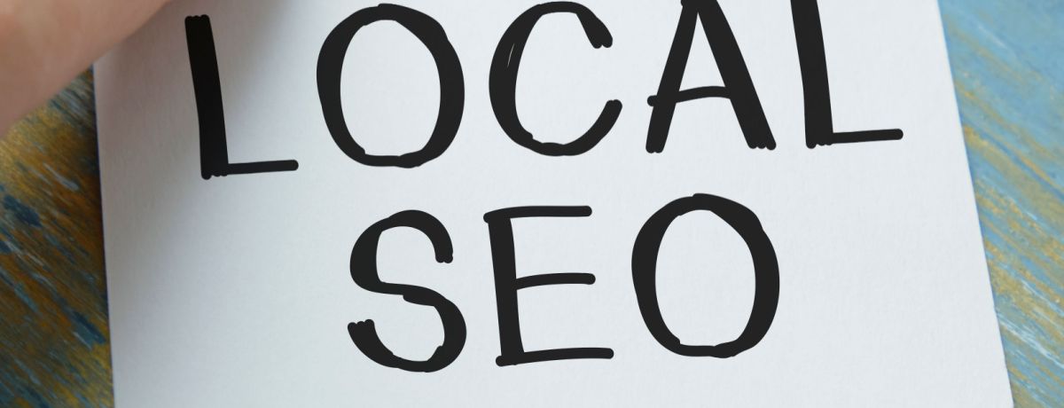 Business owner makes a note to remind him about the importance of Local SEO to his Houston digital marketing efforts.