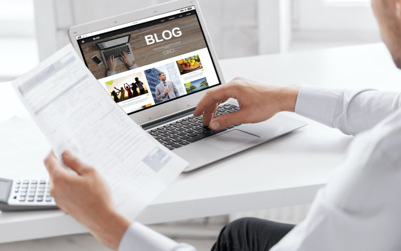 Business man reviewing his blog and evaluating content marketing and SEO strategies