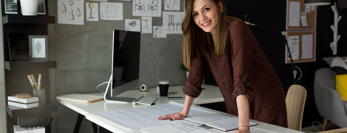 Small business owner smiling as her business expands due to Houston SEO strategy