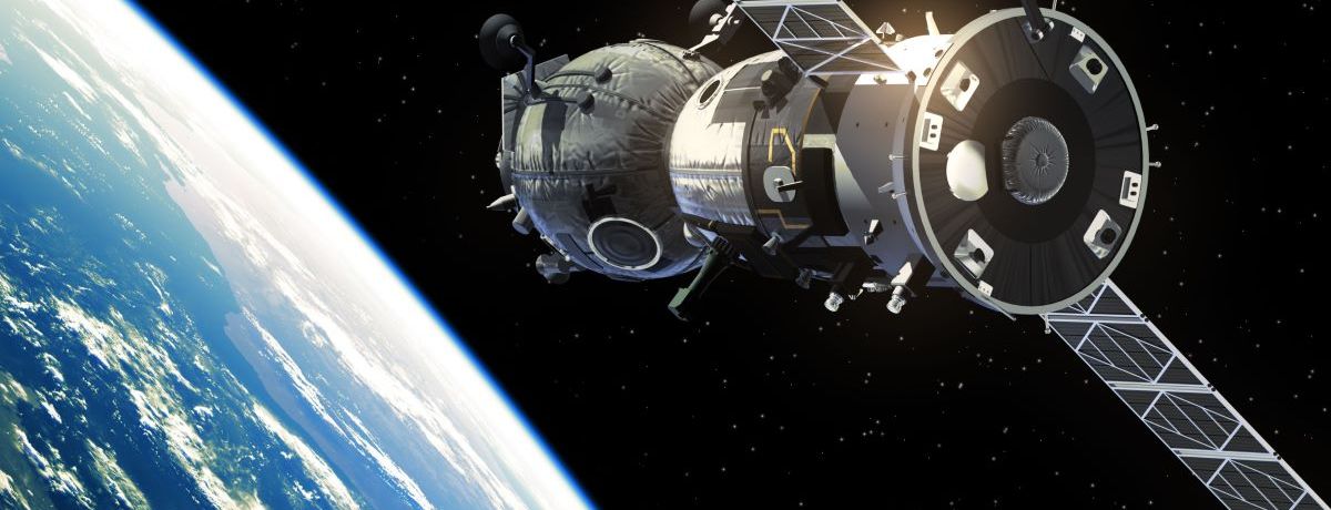 Spacecraft in orbit, representing Phase III: Orbit of our Houston marketing services