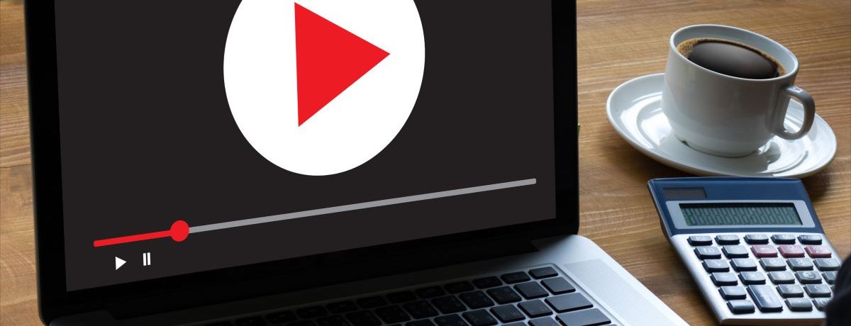 Laptop displaying video as part of a Houston digital marketing strategy.