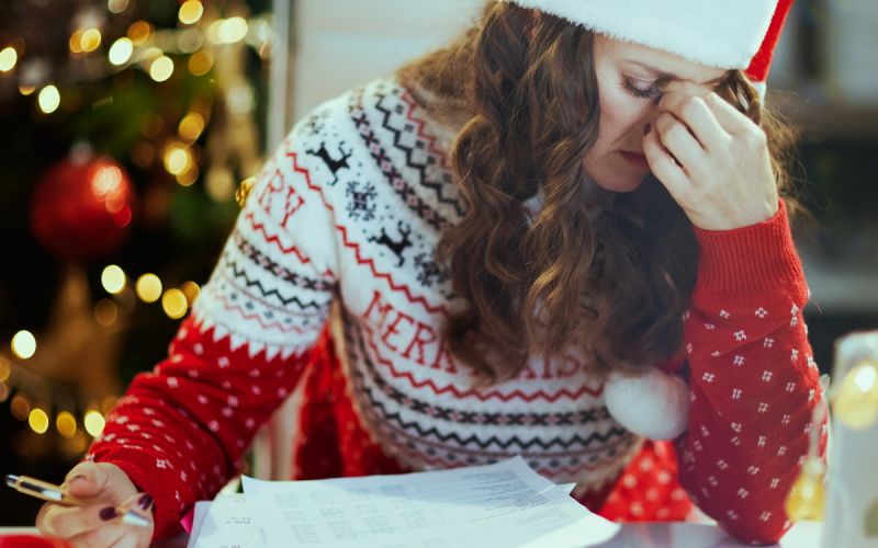 A business owner stressed over business slowing down over the holiday season partly due to not having a marketing strategy or working on her business's Local SEO