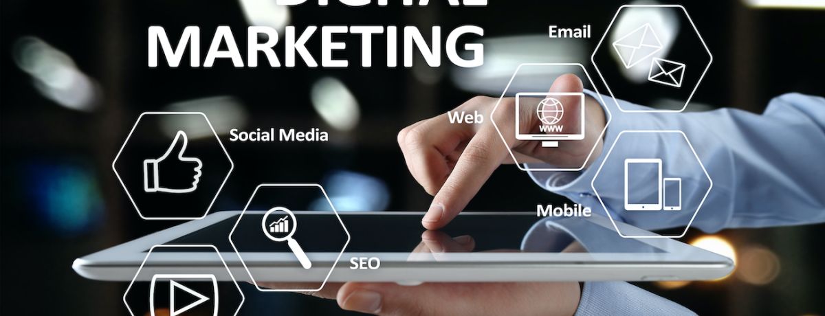 marketing expert with a tablet in hand consisting of social media, SEO, video, email, website, and mobile