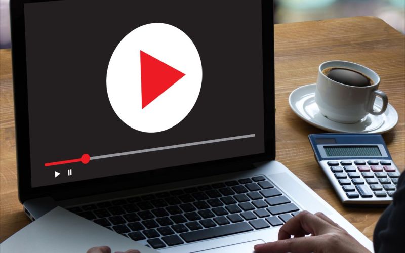 Laptop displaying video as part of a Houston digital marketing strategy.