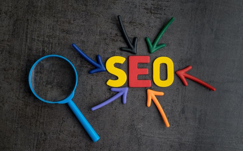 Graphic of SEO font in Google colors to illustrate what affects a business's Houston SEO strategy